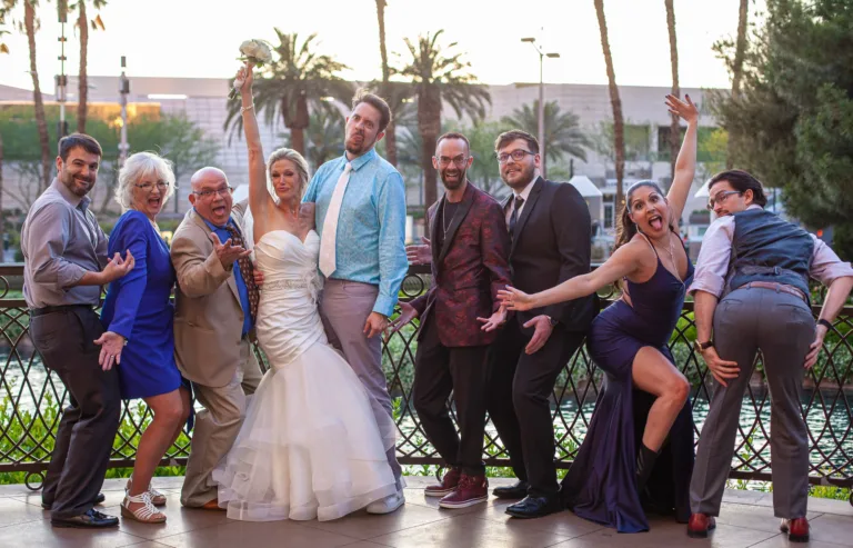 Post wedding party of the family being silly on the Las Vegas Strip in front of the Wynn Hotel.
