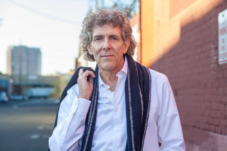This gentleman is posing for a new and improved acting headshot in the arts district of downtown Los Angeles.