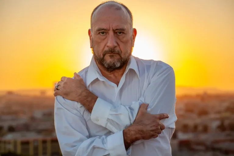 Portrait of older gentlemen at sunset with a dramatic tone taken in downtown Los Angeles in California.