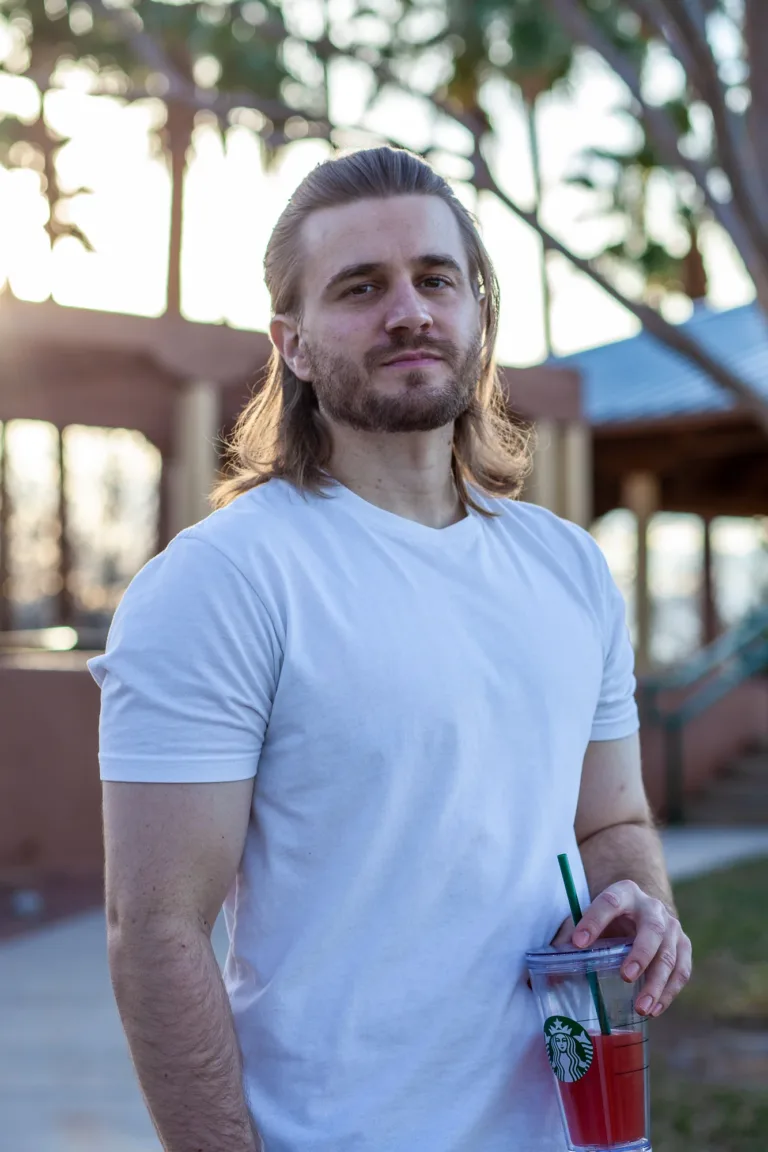 A casual portrait of a man taken at a part at sunset in Las Vegas.