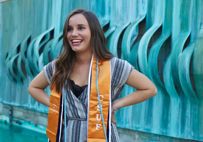 A graduation portrait of a female who recently graduated from the university of Fullerton, photo taken on campus in Fullerton, California.