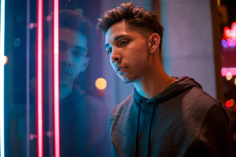 Playing with colors and light, this is a portrait of a man in the neon lights in Downtown Los Angeles.