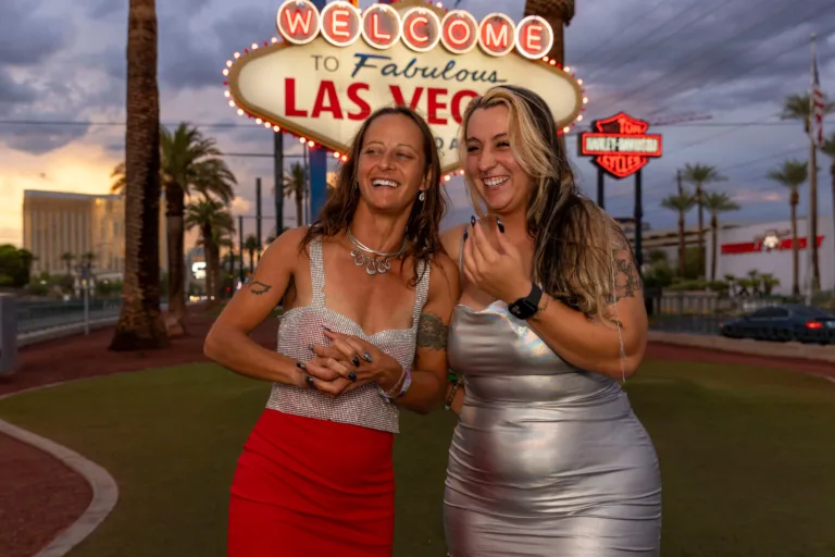 Mother and daughter area all smiles at the Las Vegas sign.