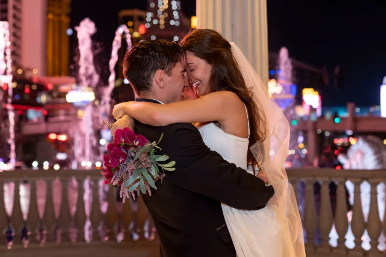 Newlywed couple enjoying the Las Vegas Strip after their wedding